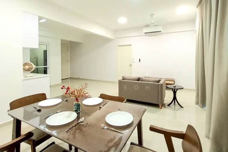 Living features: light grey fabric sofa, round side table, ceiling fan, wall-mounted split AC, cream painted walls, white ceiling, large window with sheer curtains, tile flooring, decorative plant in vase, dining table with four chairs, dinner plates on table; style: modern. Kitchen features: white cabinetry, open layout, countertop with bar seating, tile backsplash, kitchen appliances visible; style: modern.