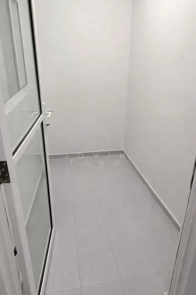 Room features: white painted walls, grey tile flooring, glass door, white door frame, corner room, natural light from glass door; style: modern.