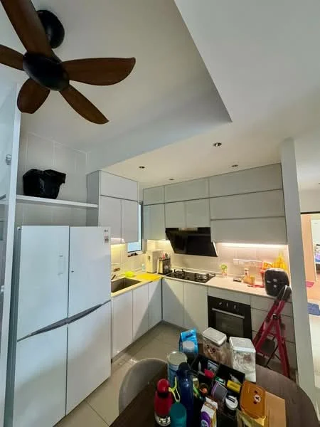 Kitchen features: white cabinetry with flat-panel design, grey upper cabinets, black countertop, stainless-steel sink, chrome pull-down faucet, built-in gas stove, built-in oven, refrigerator, ceiling fan with 3 blades, tile flooring, under-cabinet lighting, open shelving, kitchen island with seating, various kitchen appliances and utensils on countertop; style: modern.