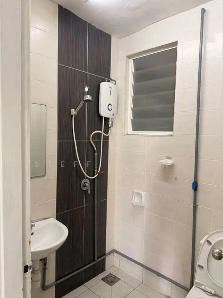 Bathroom features: shower with handheld showerhead, wall-mounted water heater, white ceramic toilet, small white sink, mirror above sink, grey accent wall, white tiled walls, tile flooring, window for ventilation, shower curtain rod, toilet paper holder; style: modern.