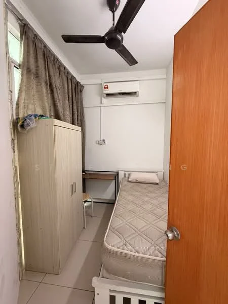 Bedroom features: single bed, mattress, wooden wardrobe, study desk, chair, wall-mounted air conditioning unit, ceiling fan, curtains, tiled flooring, white painted walls.