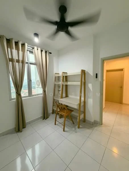 Room features: white painted walls, grey tiled flooring, 5-blade ceiling fan with light, large window with sheer curtains, wooden study desk, wooden shelving unit, neutral coloured door, light switch on wall; style: modern; view: city.