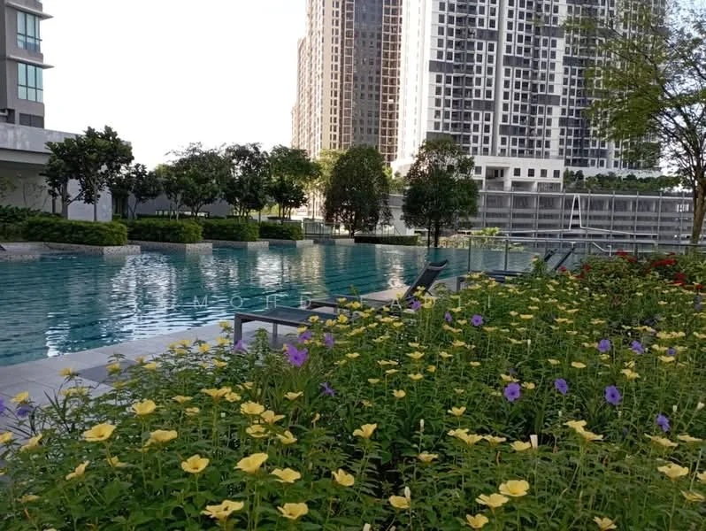 Exterior type: high-rise condominium; features: infinity pool, pool deck with loungers, manicured landscaping, flower beds with yellow and purple flowers, surrounding greenery, modern architectural design, tall residential buildings in background; style: modern.