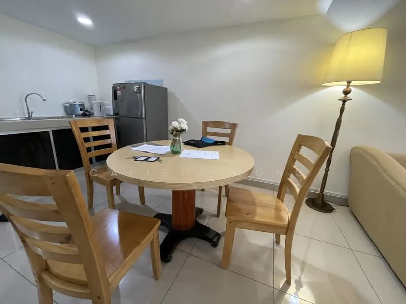Dining features: round wooden dining table, 4 wooden dining chairs, floor-to-ceiling windows, white painted walls, tile flooring, table lamp with beige shade, kitchenette with stainless-steel fridge, kitchen countertop, sink, kettle, microwave; style: modern.