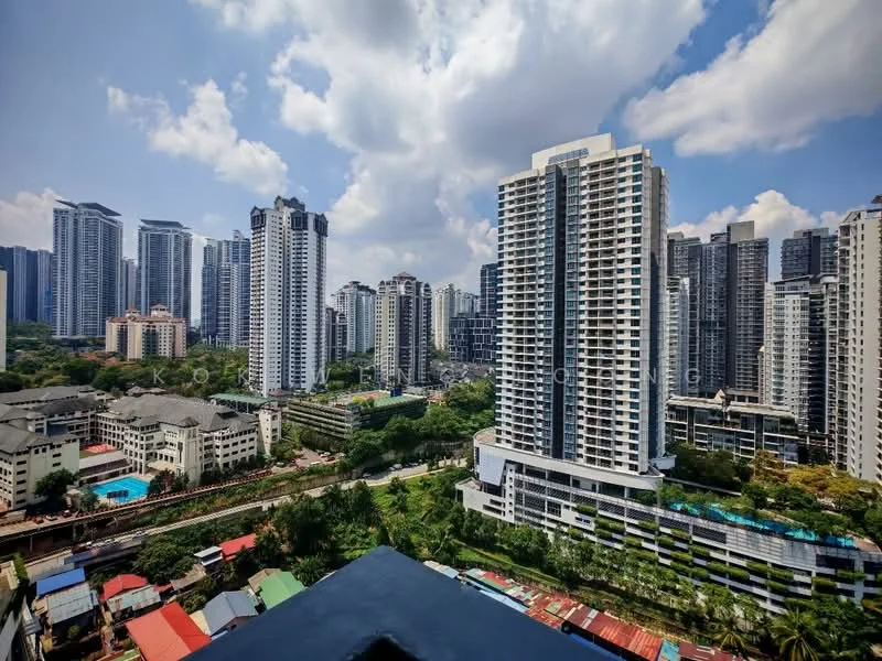 Exterior type: high-rise condominium; features: glass curtain wall, surrounded by mature greenery, swimming pool visible, urban skyline, multiple high-rise buildings, mixed-use development, city view, balconies on buildings; style: modern.
