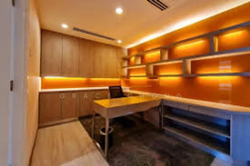 Study features: wood paneling on walls, orange accent wall, recessed LED downlights, built-in shelving with LED lighting, wooden desk, black office chair, laminate flooring, area rug, cable management system; style: modern.
