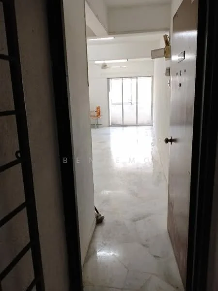 Room features: white painted walls, marble flooring, ceiling light, door with knob, glass sliding door, visible hallway, open layout, natural light from windows.