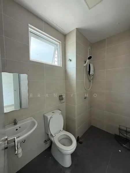 Bathroom features: white ceramic toilet, wall-mounted shower with handheld attachment, single-sink vanity with mirror, grey tile flooring, light beige tiled walls, window for natural light, chrome towel holder, wall-mounted soap dispenser; style: modern.