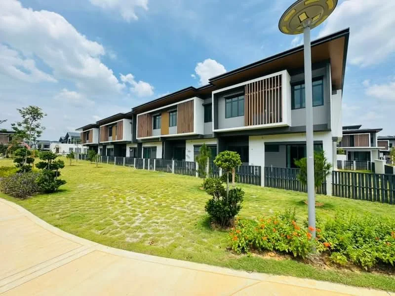 Exterior type: linked terrace house; features: two-storey linked terrace, grey painted facade, wooden accents on balconies, manicured lawn, landscaped garden with shrubs, paved walkway, fenced yard, outdoor lighting, modern architectural design, multiple windows, balconies with railings; style: modern.