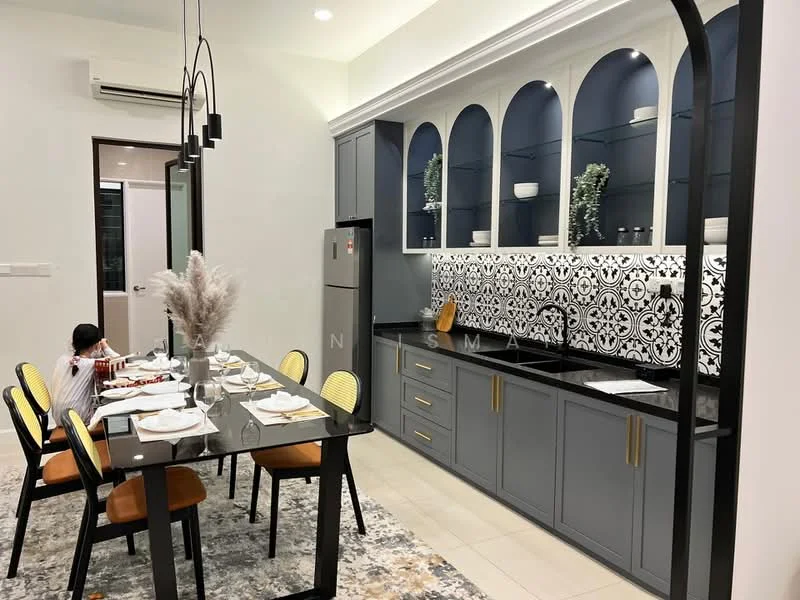 Dining features: 6-seater dining table, black dining table with gold accents, yellow upholstered dining chairs, grey cabinetry with gold handles, black countertop, decorative backsplash with black and white pattern, built-in shelves with arched design, refrigerator, decorative plants in vases, pendant lighting, cream tiled flooring, wall-mounted air conditioning unit; style: modern.