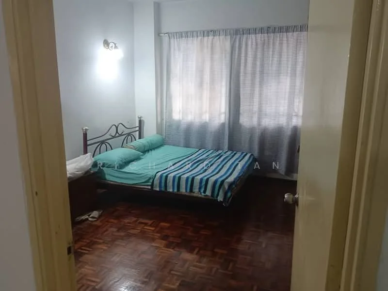 Bedroom features: wooden flooring, light blue painted walls, single bed with striped bedding, nightstand, curtains with a checkered pattern, wall-mounted light fixture, window with natural light, decorative wall mirror.