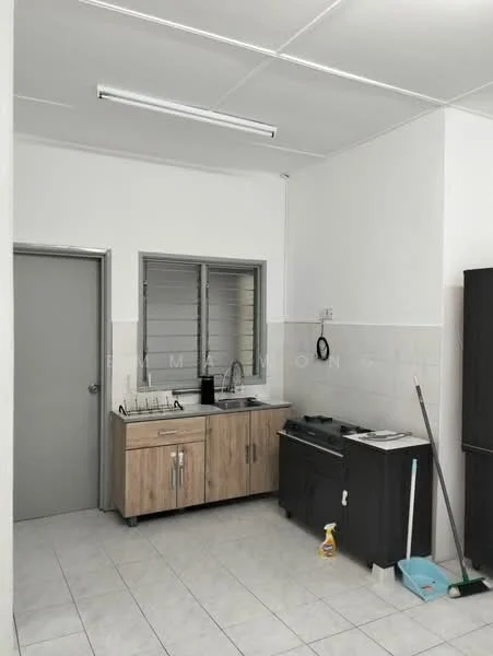 Kitchen features: white painted walls, tile flooring, wooden cabinetry with light brown finish, stainless-steel sink, chrome pull-down faucet, freestanding gas stove, countertop space, window with metal grilles, cleaning supplies on the floor; style: modern.