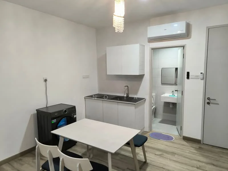 Kitchen features: white cabinetry, single-bowl stainless-steel sink, chrome pull-down faucet, built-in washing machine, white tiled backsplash, recessed downlights, wall-mounted split AC, dining table with white surface, 3 white dining chairs, grey flooring; style: modern. Bathroom features: white wall tiles, mirror above sink, chrome basin mixer, one-piece toilet, grey flooring.