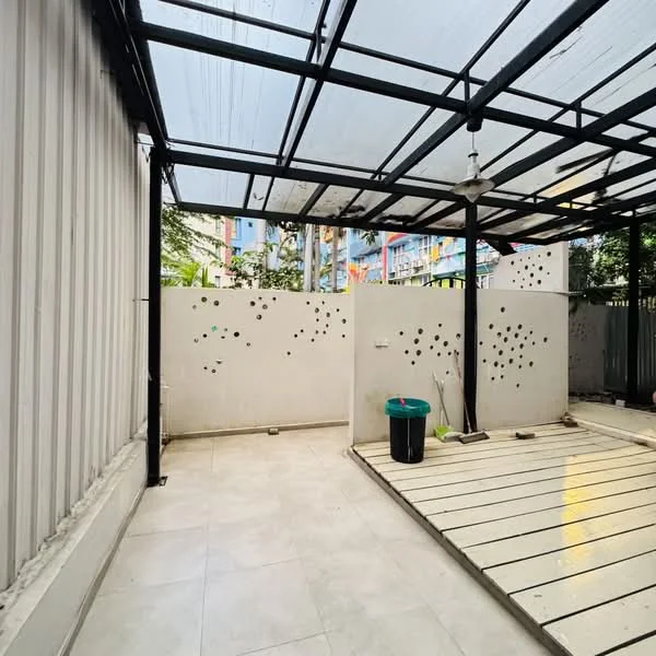 Room features: glass roof, metal frame structure, white painted walls, tile flooring, outdoor space, ceiling fan, drainage system, greenery visible outside; style: modern; view: garden.