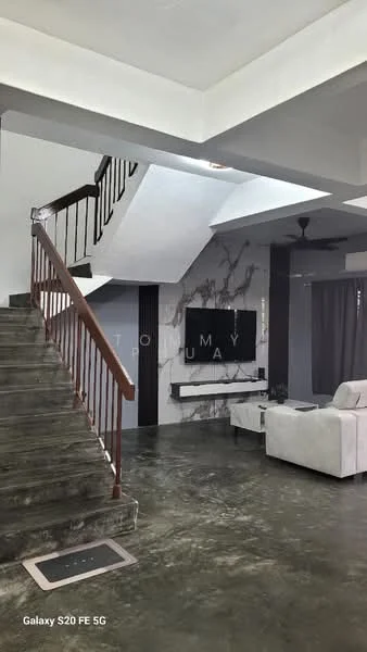 Living features: grey accent wall, white walls, exposed concrete flooring, 5-blade ceiling fan, wall-mounted TV, sofa in white fabric, coffee table, staircase with wooden railing, large windows with sheer curtains, decorative wall paneling; style: modern. Hallway features: staircase with wooden steps, white walls, natural light from skylight; style: modern.