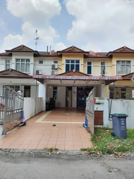 Exterior type: linked terrace house; features: two-storey building, tiled roof, cream painted facade, front porch with tiled flooring, metal gate, visible air conditioning units, manicured lawn, paved driveway, decorative awning, windows with grilles, front entrance with steps; style: modern.