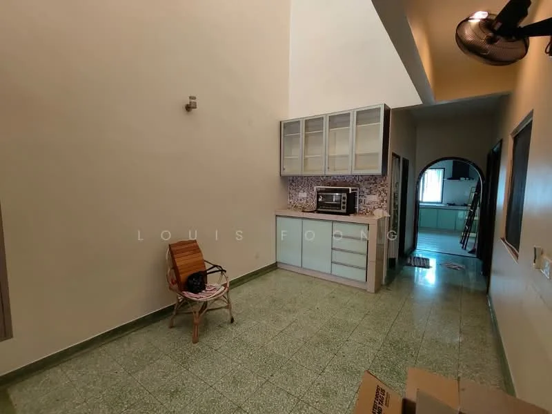 Room features: green terrazzo flooring, white painted walls, high ceiling, kitchen cabinetry with glass-front upper cabinets, microwave, countertop, arched doorway leading to another room, ceiling fan, wooden chair, cardboard box; style: modern.