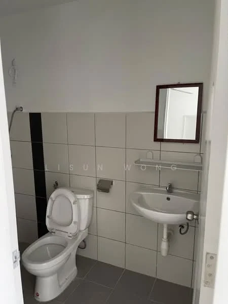 Bathroom features: white ceramic toilet, single-sink vanity with wall-mounted faucet, mirror above sink, white tiled walls, grey tiled flooring, shower area with wall-mounted showerhead, toilet paper holder, soap dish, hand towel rack.