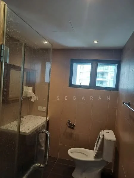 Bathroom features: glass shower enclosure, rain shower head, single-sink vanity with countertop, white ceramic toilet, wall-mounted towel rack, tile flooring, brown tiled walls, window with view, mirror above vanity, recessed lighting; style: modern.