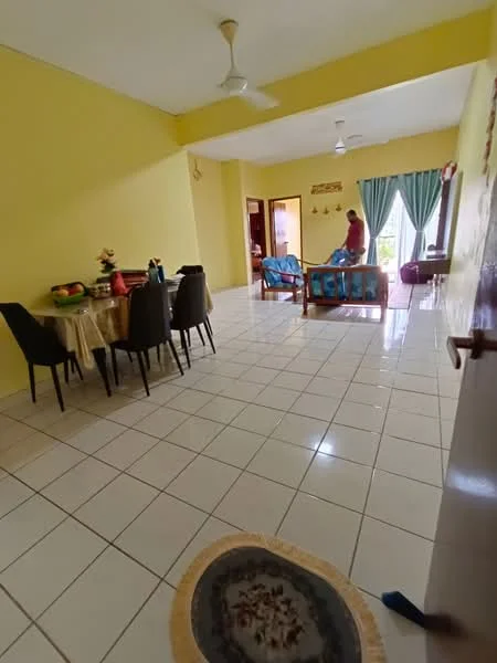 Living features: yellow painted walls, white tiled flooring, 5-blade ceiling fan, sofa with blue upholstery, coffee table, dining table with tablecloth, 4 dining chairs, curtains in light blue, decorative rug, wall-mounted artwork; style: modern.