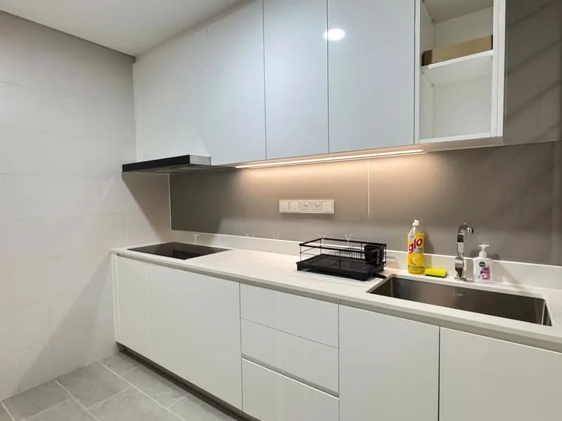 Kitchen features: white cabinetry with flat-panel doors, grey backsplash, white countertop, single-bowl stainless-steel sink, chrome pull-down faucet, built-in oven, stainless-steel range hood, grey tile flooring, under-cabinet lighting, dish drying rack, cleaning supplies on countertop; style: modern.