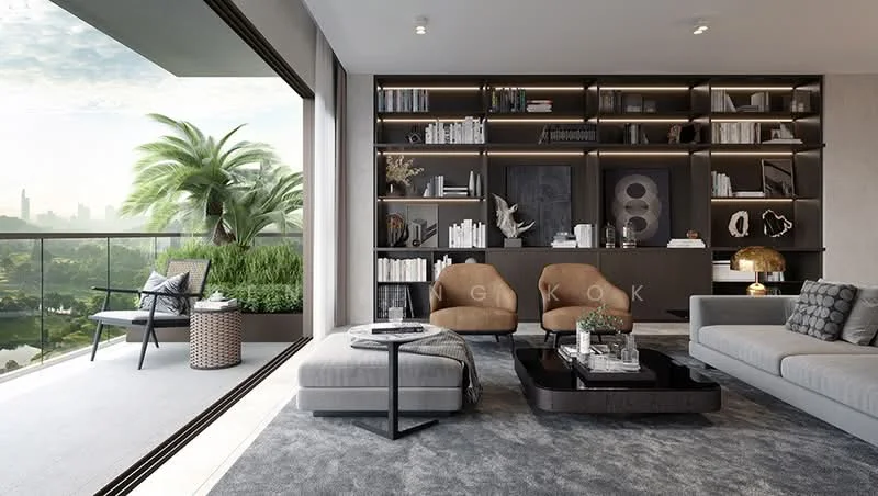 Living features: grey fabric sofa, 2 brown accent chairs, black coffee table, area rug with geometric pattern, built-in shelving unit with books and decor, floor-to-ceiling windows, sliding glass door, outdoor balcony view, decorative table lamp, potted plants, wall-mounted artwork, recessed downlights; style: modern; view: garden.