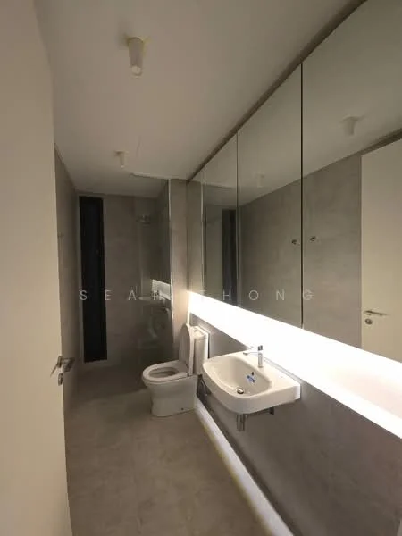 Bathroom features: grey tile flooring, light grey wall tiles, large mirror above sink, single-sink vanity with white cabinet, chrome basin mixer faucet, one-piece toilet, glass shower enclosure, recessed ceiling lights; style: modern.