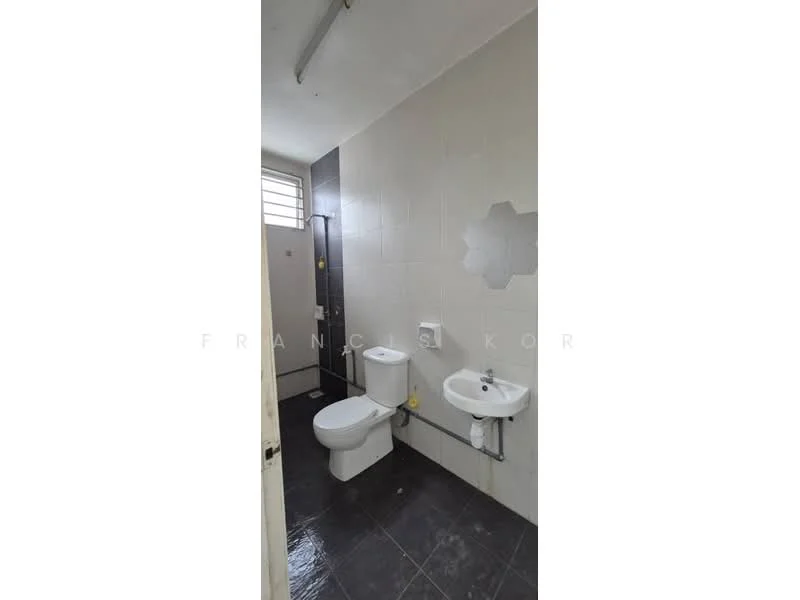 Bathroom features: white tiled walls, grey floor tiles, one-piece toilet, wall-mounted sink, chrome basin mixer faucet, shower with wall-mounted showerhead, window for natural light, exposed plumbing, towel rail; style: modern.