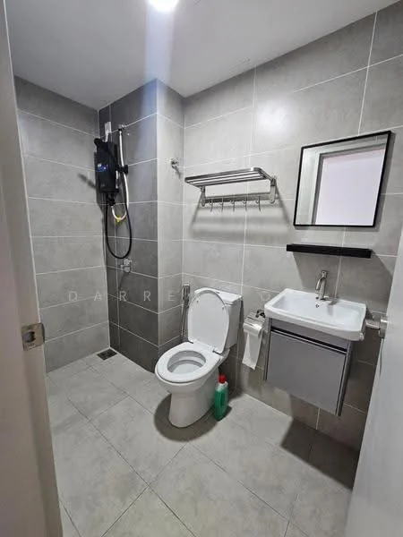 Bathroom features: grey ceramic tile flooring, grey tiled walls, one-piece toilet, single-sink vanity with metal cabinet, framed mirror, shower with wall-mounted shower head, towel rack, soap dispenser, toilet paper holder, wall-mounted storage shelf; style: modern.