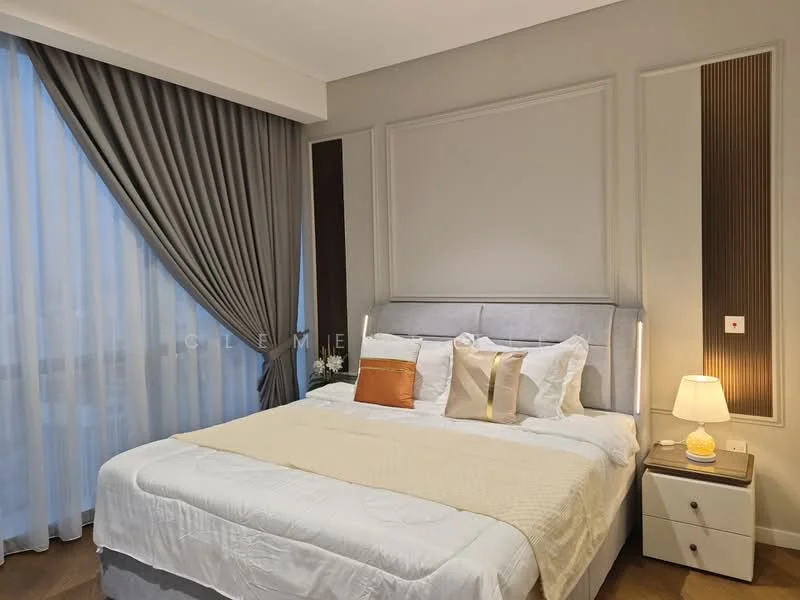 Bedroom features: king-size bed with upholstered headboard, white bedding with decorative pillows, nightstand with lamp, floor-to-ceiling windows with sheer curtains, grey curtains, wooden flooring, accent wall with paneling, decorative wall features, wall-mounted light fixtures; style: modern.