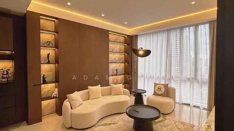 Living features: curved white sofa, black coffee table, white side table, wooden feature wall, built-in shelving with lighting, decorative sculptures on shelves, recessed LED lighting, floor-to-ceiling windows with sheer curtains, marble flooring, green area rug; style: modern; view: city.