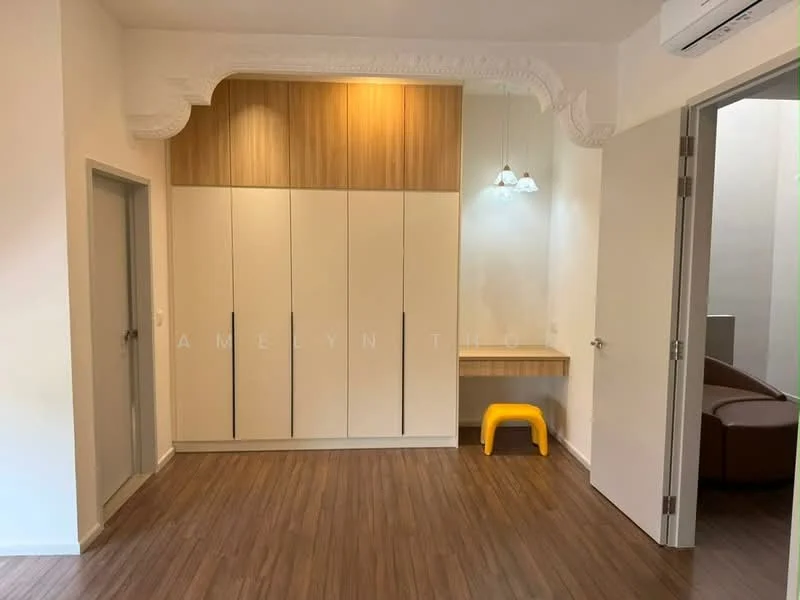 Room features: wooden flooring, white painted walls, built-in wardrobe with cream cabinet doors, wooden accent wall, recessed lighting, pendant light fixture, small study desk, air conditioning unit; style: modern.
