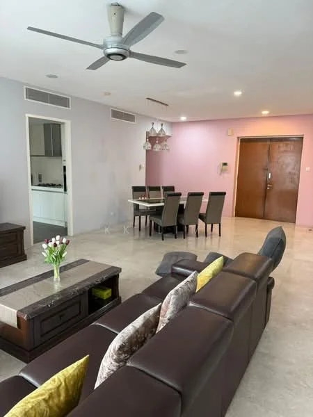 Living features: 3-seater leather sofa in dark brown, 2 accent pillows in grey and yellow, coffee table with storage, ceiling fan with light, marble flooring, wall-mounted light switch, decorative vase with tulips, open layout to dining area; style: modern. Dining features: 6-seater dining table, upholstered dining chairs in dark grey, chandelier light fixture, wall with pink paint, wall with light grey paint, open layout to living area; style: modern. Kitchen features: open kitchen layout, white cabinetry, countertop with bar seating, unknown appliances; style: modern.