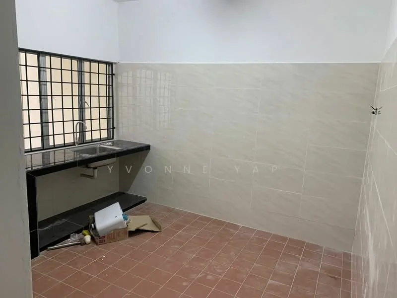 Laundry features: single-bowl stainless-steel sink, black countertop, white tiled walls, light grey tiled flooring, metal window grille, natural light from window, shelving unit below sink, cardboard box on floor.