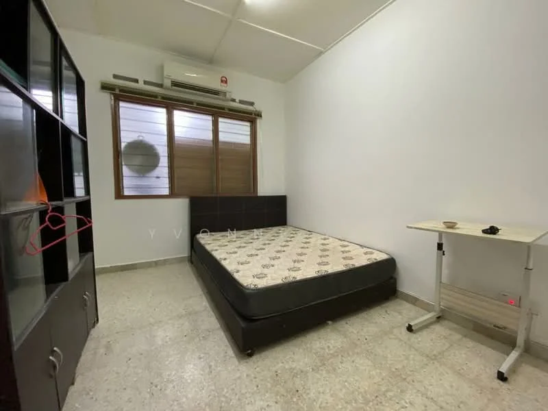 Bedroom features: single bed, mattress on bed frame, window with wooden blinds, air conditioning unit, light-colored walls, tile flooring, black headboard, small study table, black shelving unit.