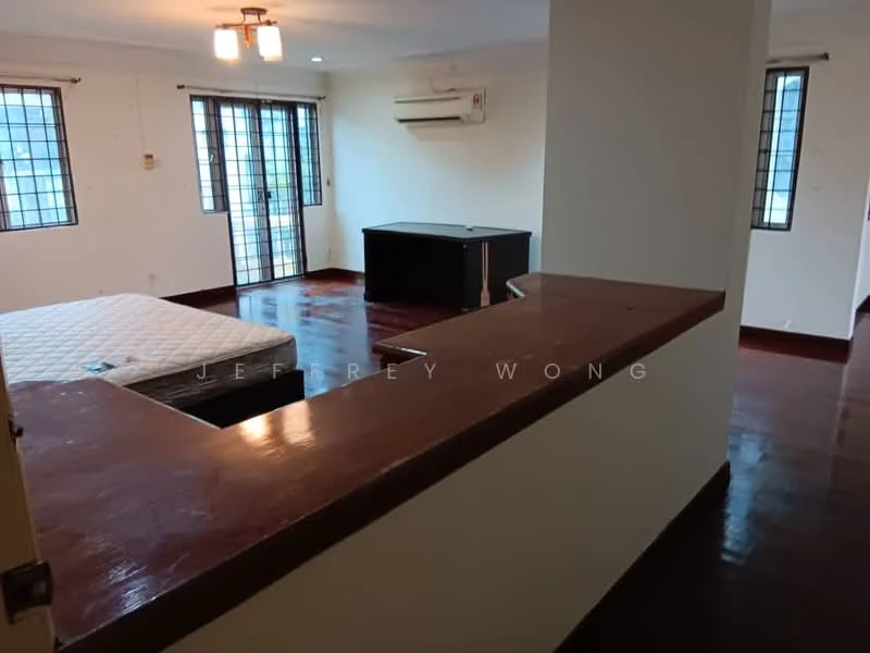 Room features: wooden flooring, white painted walls, 2 windows with black grills, 1 wall-mounted split AC, ceiling light fixture, open kitchen counter, unmade bed with mattress, black TV console.