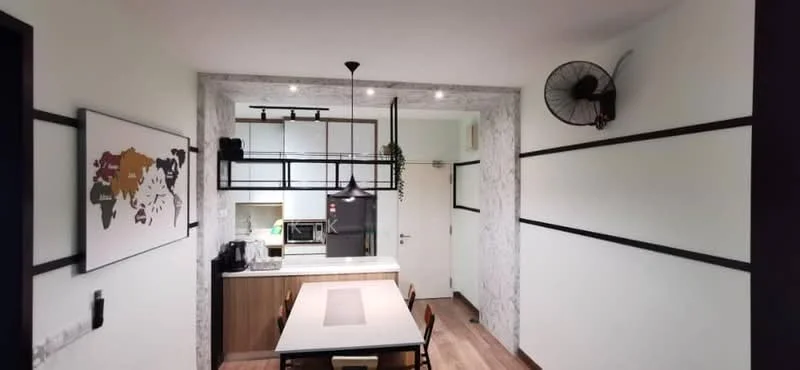 Kitchen features: white painted walls, wooden flooring, black pendant light, ceiling fan, kitchen island, black countertop, stainless-steel sink, built-in oven, microwave, coffee machine, open shelving, wall-mounted cabinets, decorative wall art; style: modern.