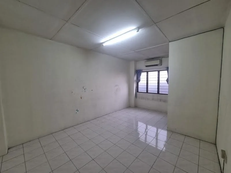 Room features: white painted walls, white ceiling, fluorescent lighting, tile flooring, single window with curtains, air conditioning unit.
