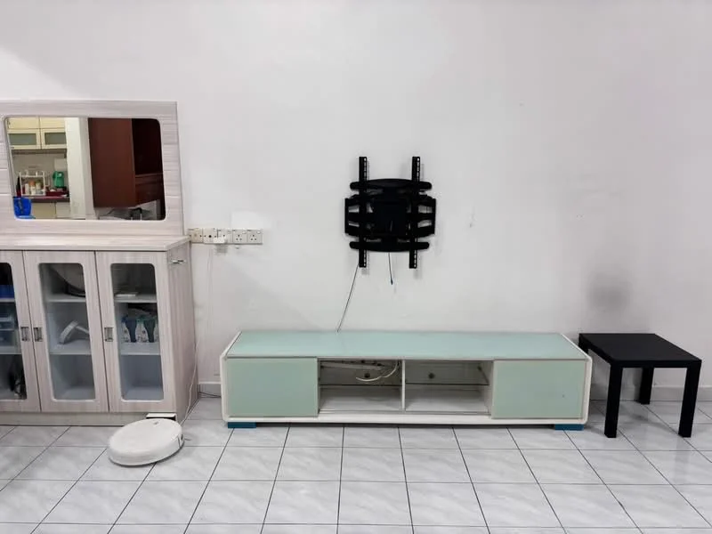 Room features: white painted walls, grey tiled flooring, TV console with storage, black side table, wall-mounted TV bracket, glass-front cabinet, cleaning robot, electrical outlets, cable management, minimalist decor; style: modern.