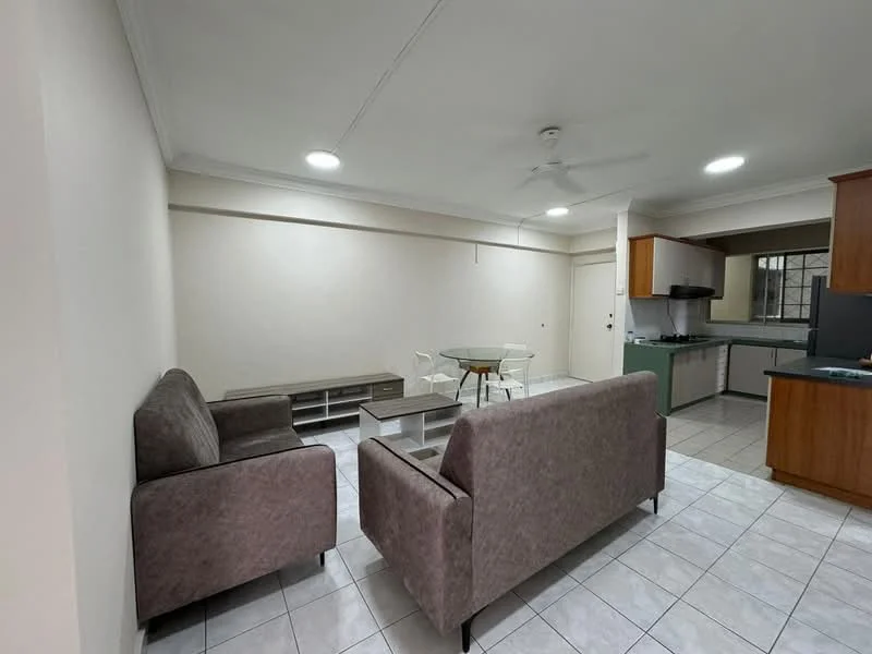 Living features: 2-seater fabric sofa in grey, 3-seater fabric sofa in grey, coffee table, dining table with glass top, 4 white dining chairs, ceiling fan, recessed LED downlights, white painted walls, tile flooring, window with grid pattern, open layout to kitchen; style: modern. Kitchen features: kitchen cabinets in wood finish, stainless-steel sink, built-in stove, countertop with green glass finish, tile backsplash, refrigerator, open layout to living area; style: modern.