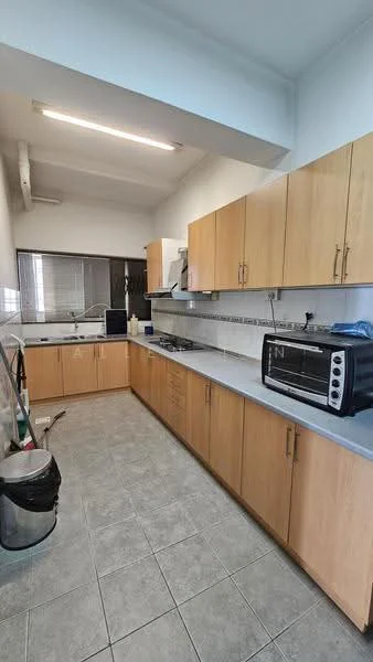 Kitchen features: light wood cabinetry, grey countertop, stainless-steel sink, built-in gas stove, microwave, tile flooring, wall-mounted extractor hood, window with grid pattern, recessed ceiling lights, kitchen trash bin; style: modern.