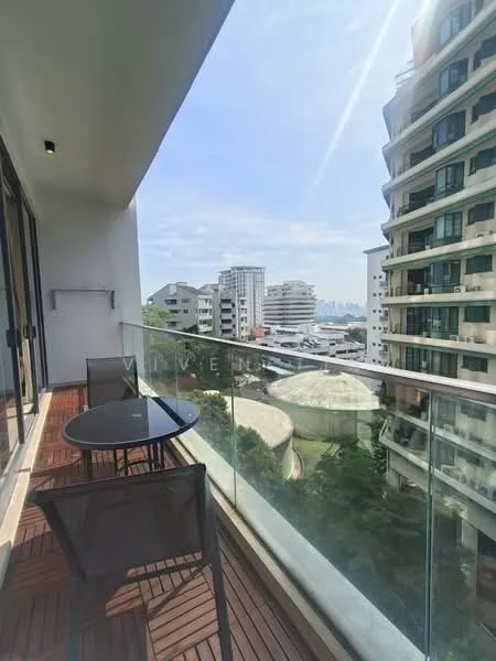 Balcony features: glass railing, wooden decking, round table, two black chairs, city skyline view; style: modern; view: city.