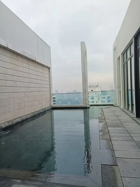 Exterior type: high-rise condominium; features: infinity pool, stone-paved walkway, glass railing, city skyline view, water feature, modern architectural design; style: modern.