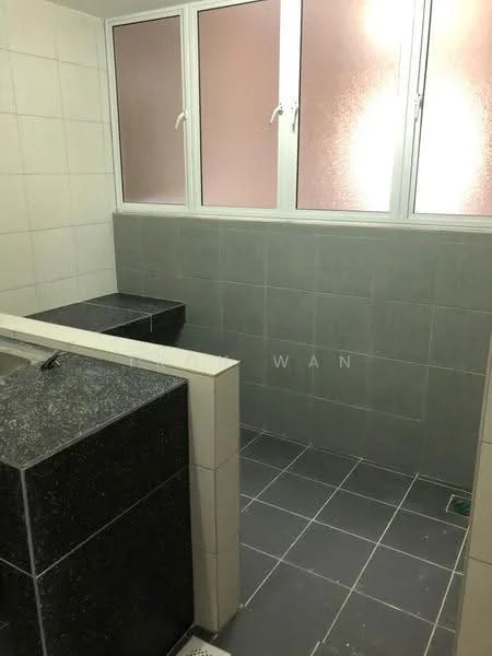 Bathroom features: grey tiled walls, white tiled walls, grey floor tiles, two black stone countertops, three windows with frosted glass, sink area, shower area, drainage outlet.