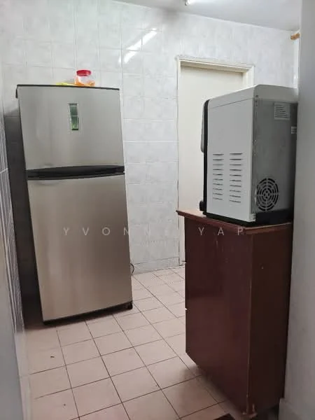 Kitchen features: stainless-steel fridge, wooden cabinet, tile flooring, white tiled walls, door to another room, countertop space.