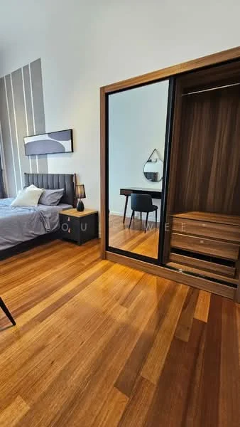 Bedroom features: king-size bed with grey bedding, upholstered headboard, nightstand with lamp, built-in wardrobe with sliding mirror doors, wooden flooring, desk with chair, decorative wall mirror, accent wall with vertical stripes; style: modern.