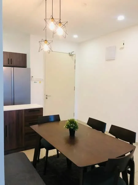 Dining features: wooden dining table, black dining chairs, pendant lighting with geometric design, white walls, light-colored flooring, stainless-steel fridge, wood cabinetry, countertop, air conditioning unit on wall; style: modern.