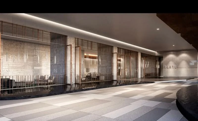 Exterior type: high-rise condominium; features: modern facade with glass and stone elements, recessed balconies, feature lighting, manicured landscaping, water feature, open-air lobby area, contemporary architectural design, polished stone flooring, metal railings, large windows, seating area, elegant entrance; style: modern.
