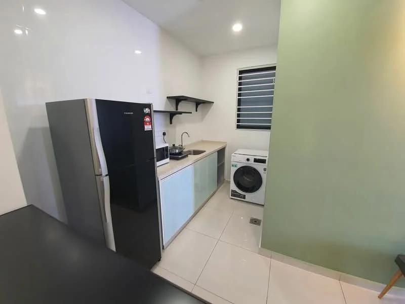 Kitchen features: black stainless-steel fridge, white cabinetry, light-colored countertop, single-bowl stainless-steel sink, chrome pull-down faucet, built-in shelves, front-load washing machine, white tiled flooring, white painted walls, green accent wall, sliding window with horizontal bars, recessed lighting; style: modern.