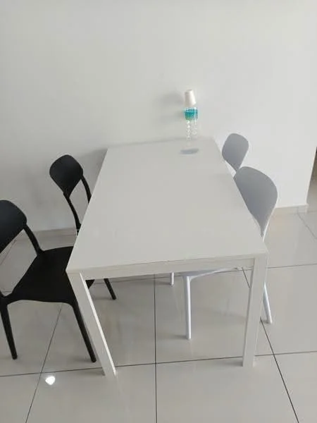 Dining features: white rectangular dining table, 4 dining chairs in black and grey, glossy tile flooring, white painted walls, table lamp with blue base; style: modern.
